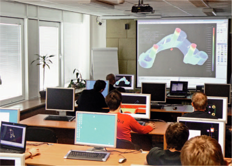 Studenti při práci na semestrálním projektu. Studenti při práci na semestrálním projektu.